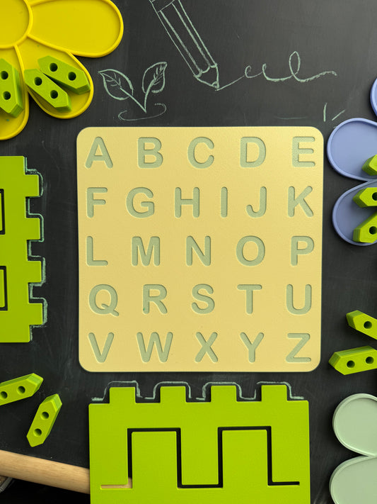 Top view of a 3D printed alphabet tracing board with uppercase letters, designed for Montessori-inspired pre-writing practice and fine motor skill devepment