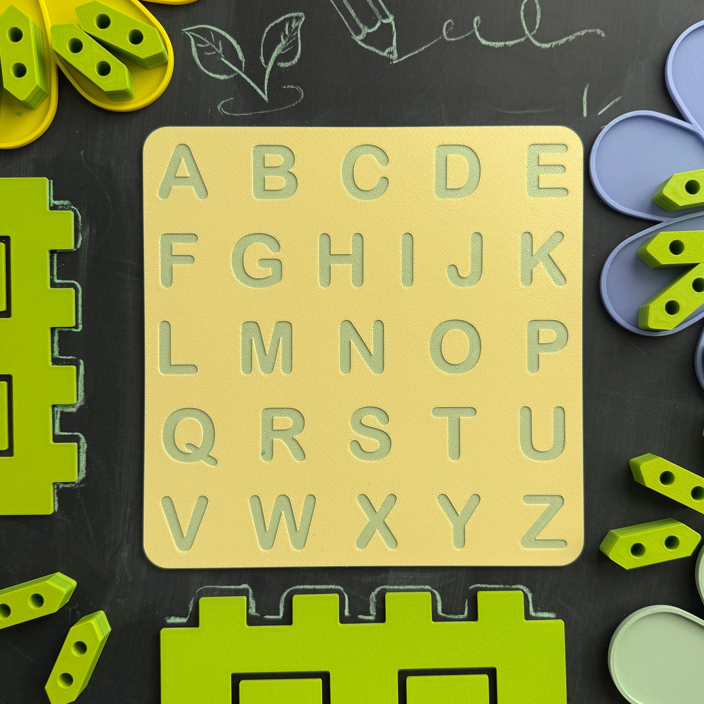 3D printed Montessori-inspired tracing board featuring uppercase English alphabet letters, designed for early literacy and fine motor skill development